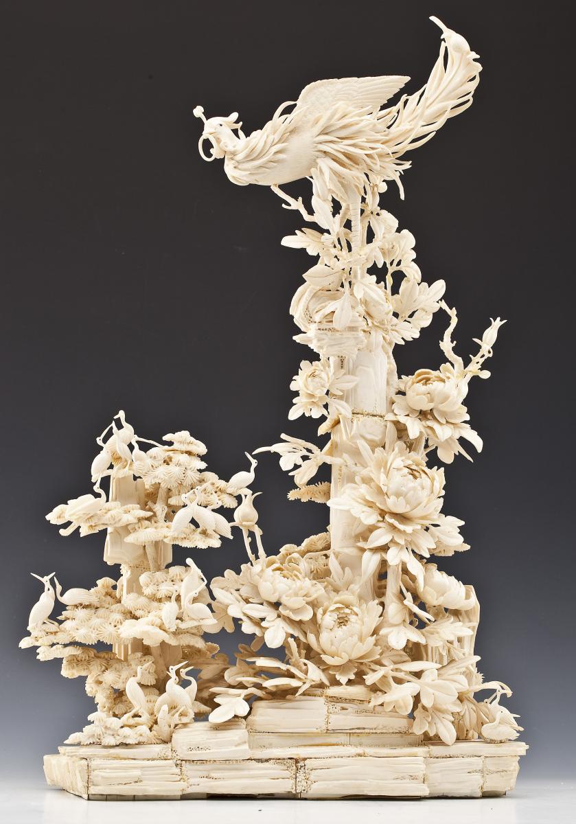 24 inch Carved Ivory Figure of Phoenix in Foliage ($2,000-3,000)